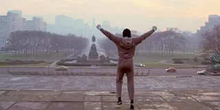 An iconic still from the original Rocky movie training scene