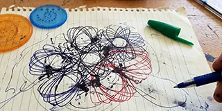 A picture of a messy, unattractive spirograph design